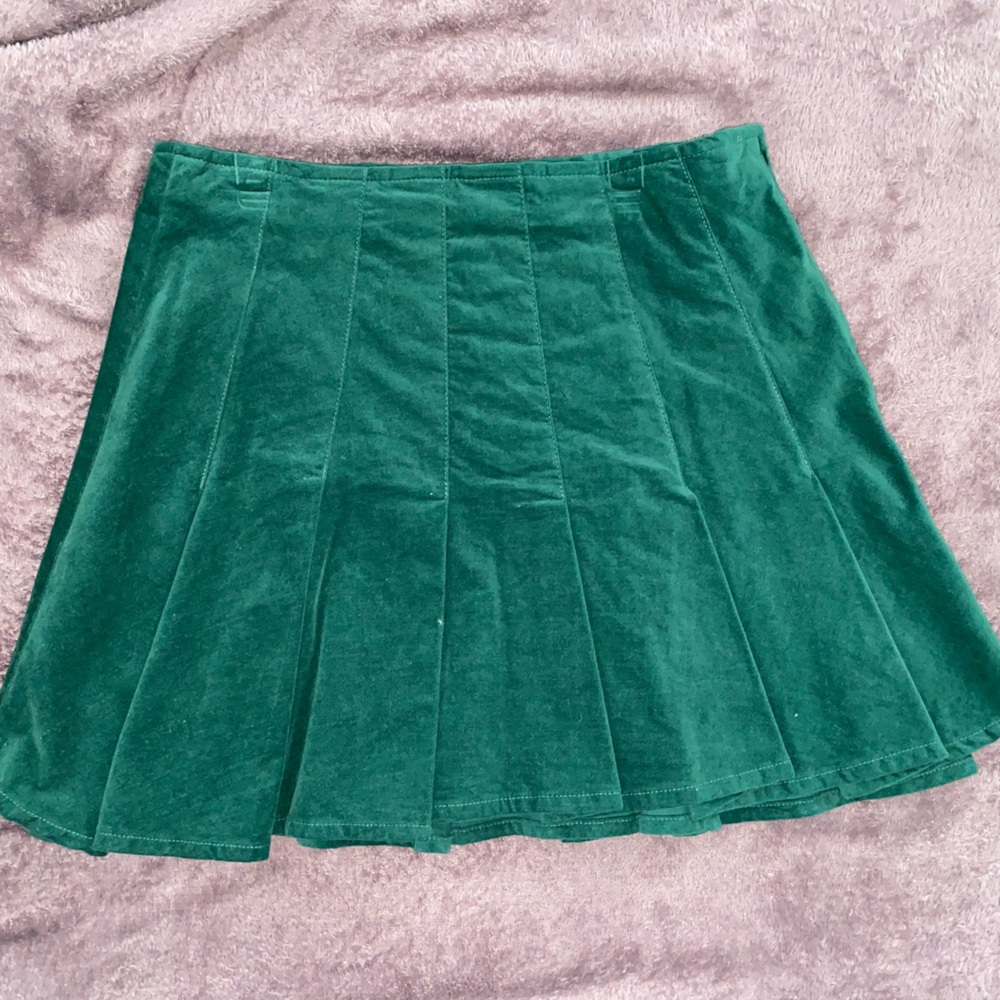 Green suede pleated mini skirt